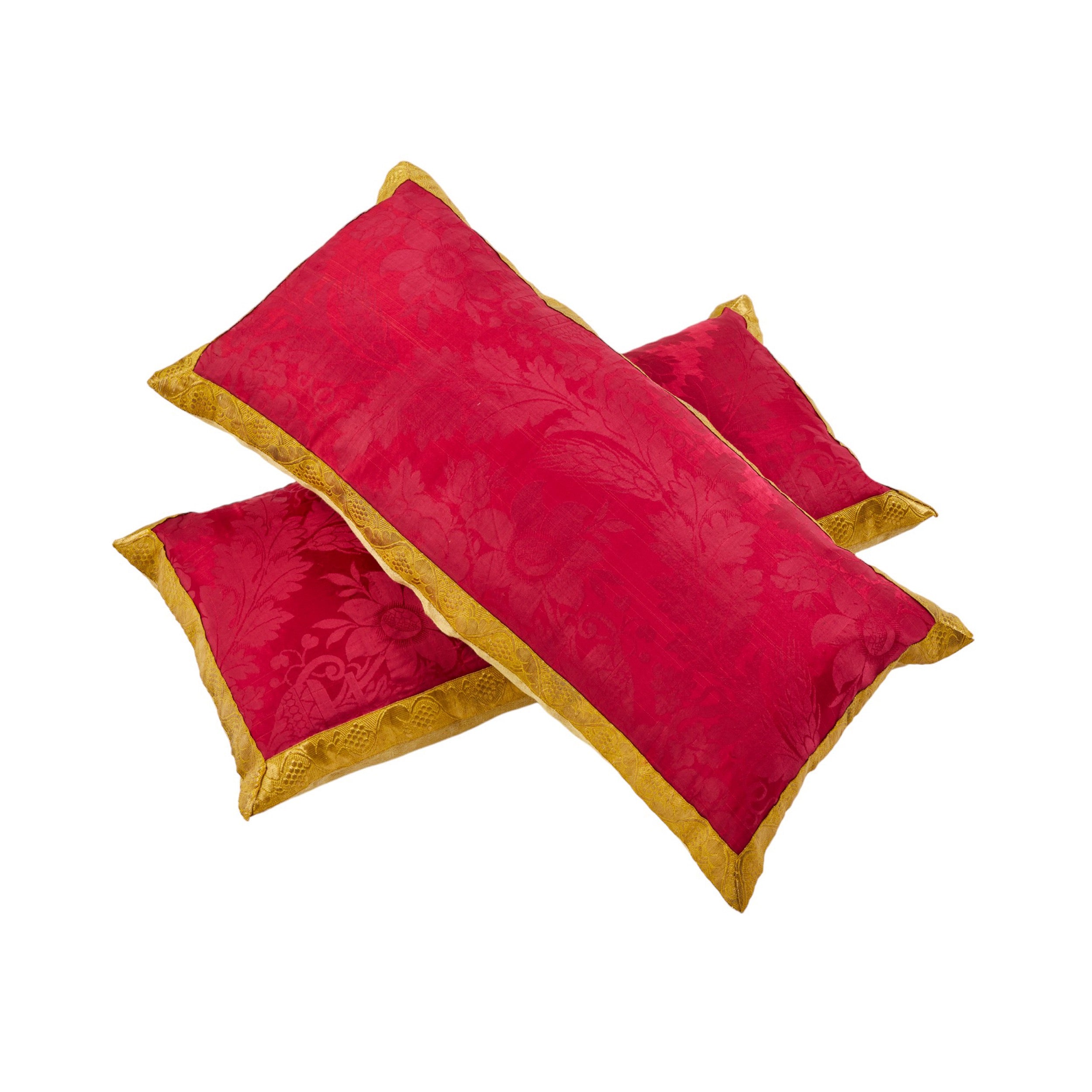 A Pair of Cushions made from an Early 19th Century Magenta Silk Damask with Antique Gold Braid