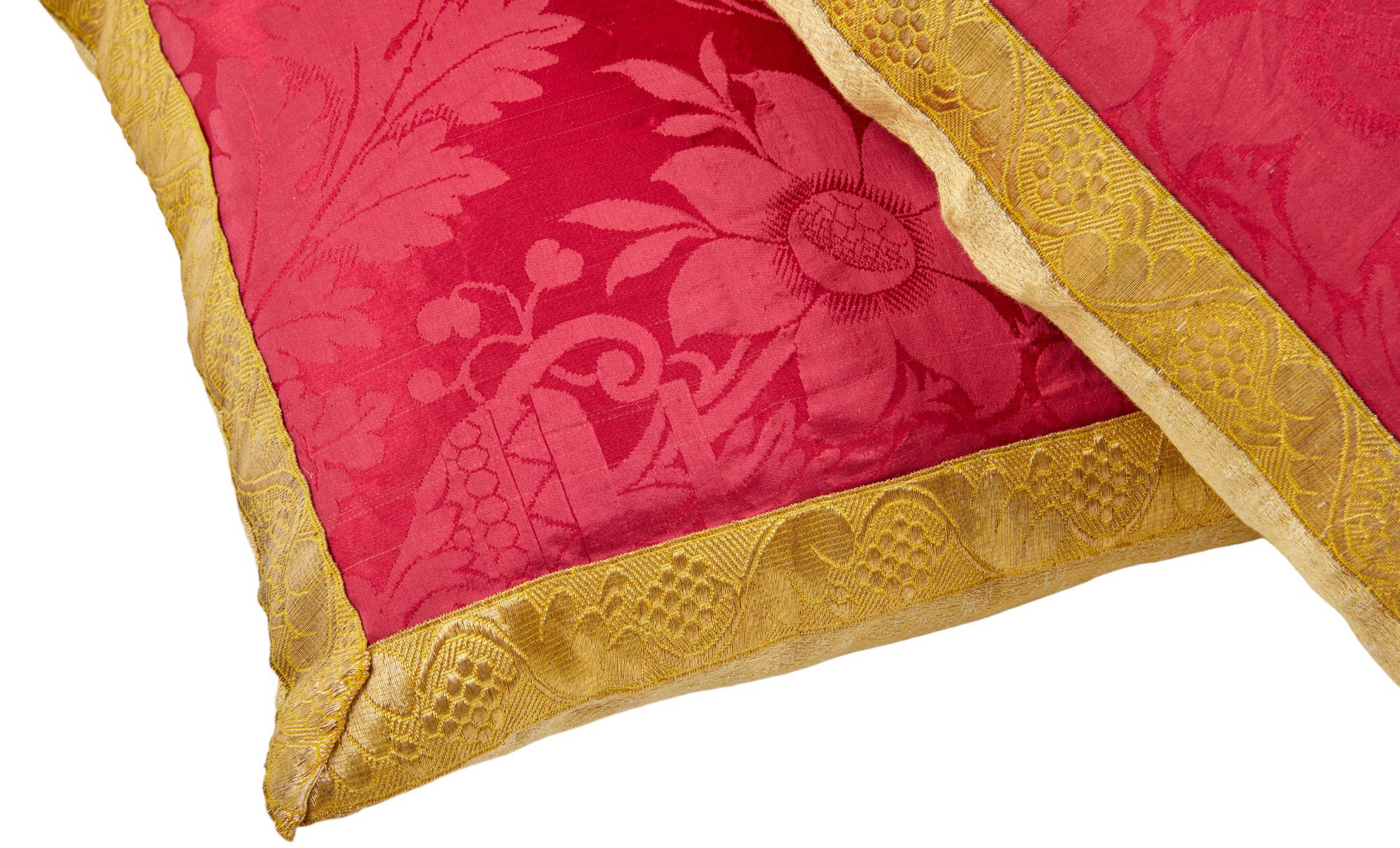 A Pair of Cushions made from an Early 19th Century Magenta Silk Damask with Antique Gold Braid