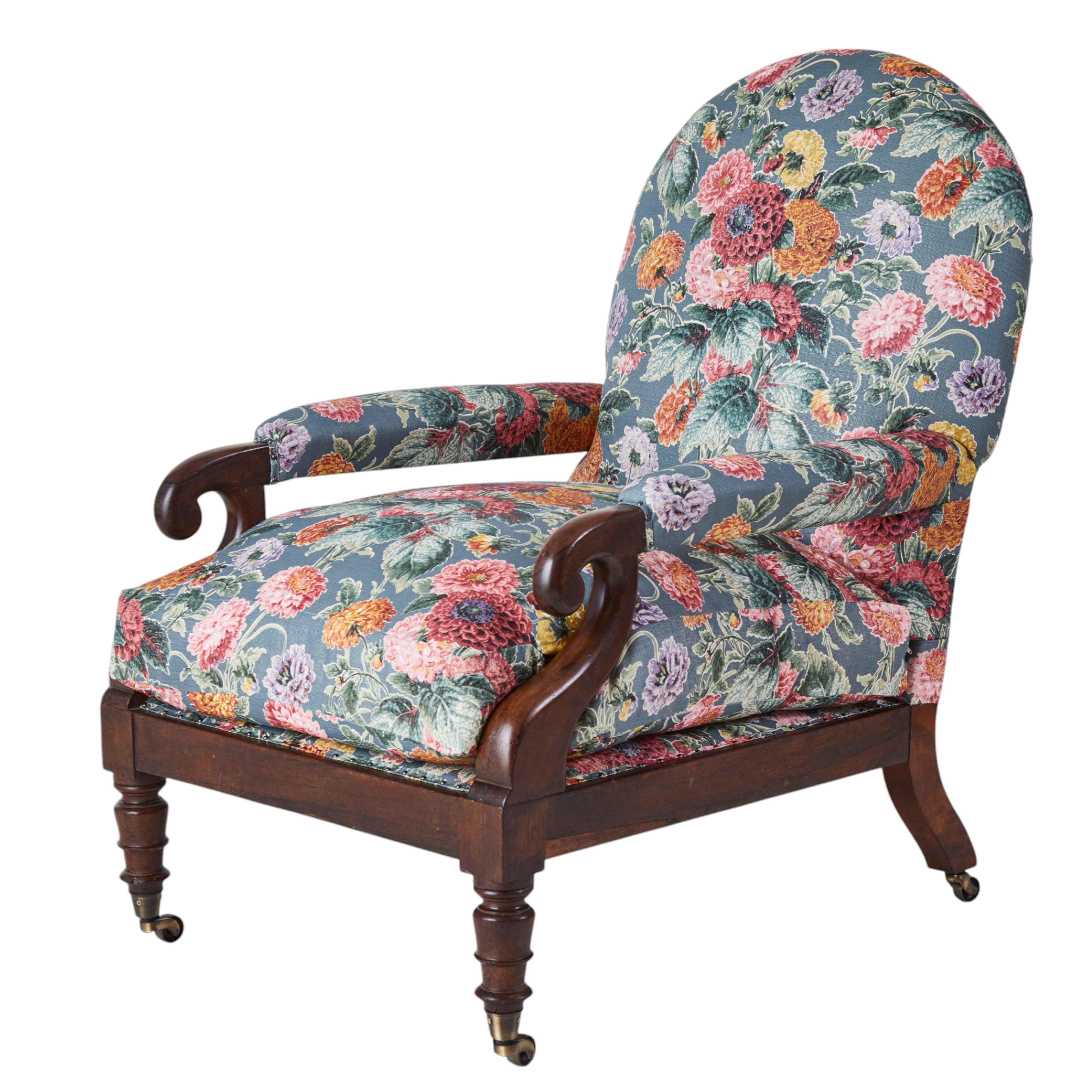 A 19th Century Round backed scroll armed chair upholstered in Flora Soames Dahlias