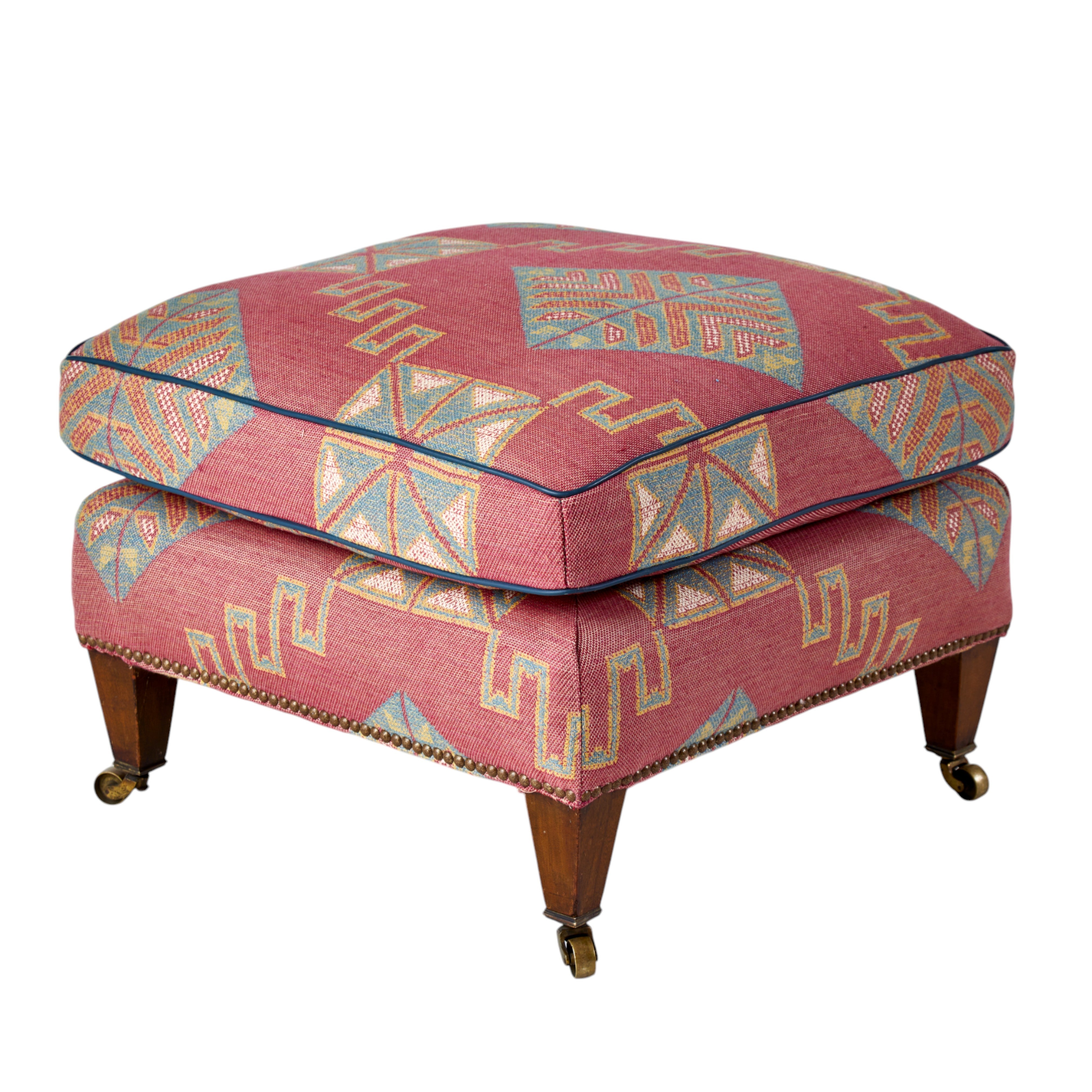 An original Howard Stool upholstered in Chartwell Weave Pink