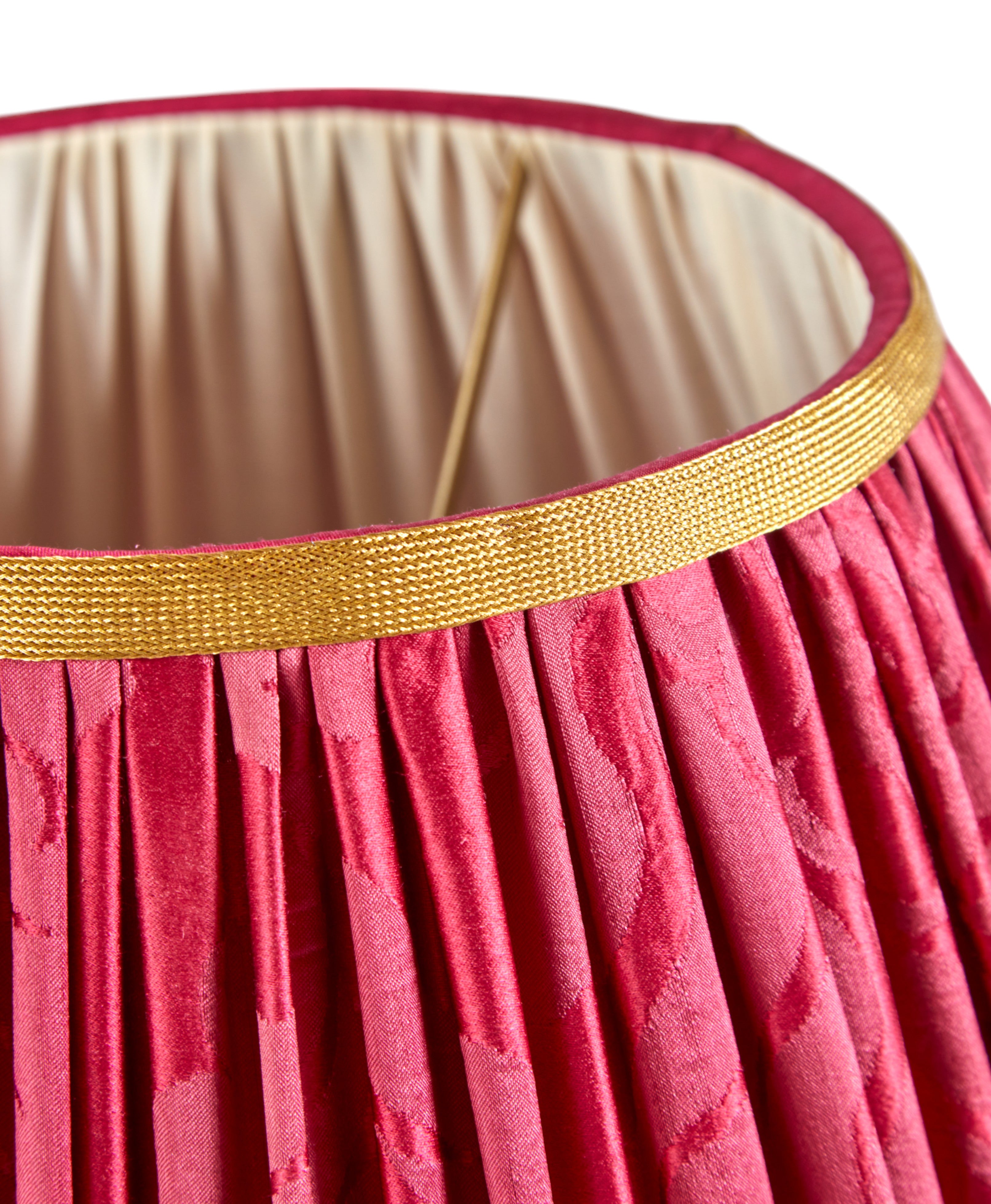 A pair of gathered lampshades in antique French damask with gold woven trimming