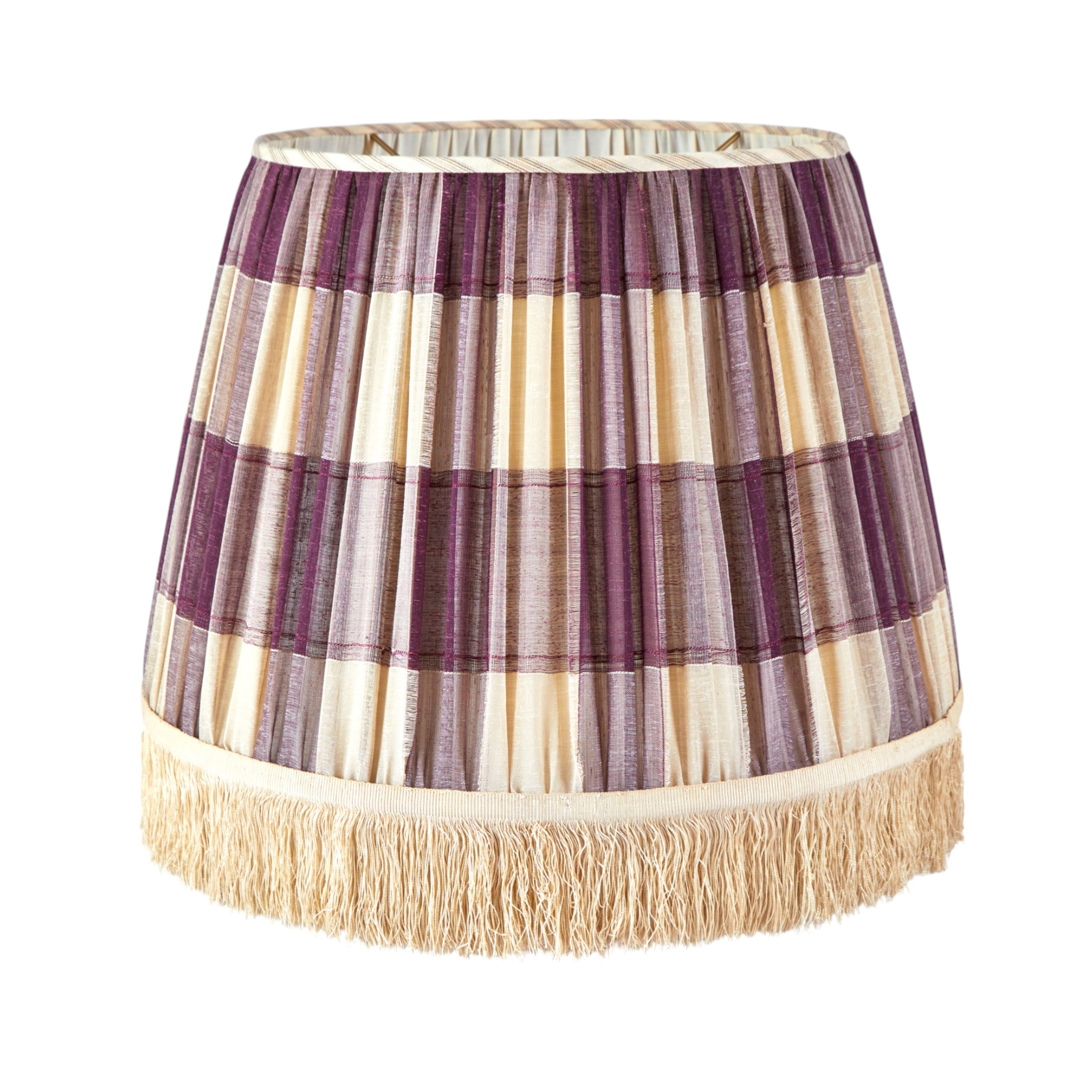 A pair of large gathered shades made from a fine, oversized, aubergine checked voile with antique ivory silk cut fringe