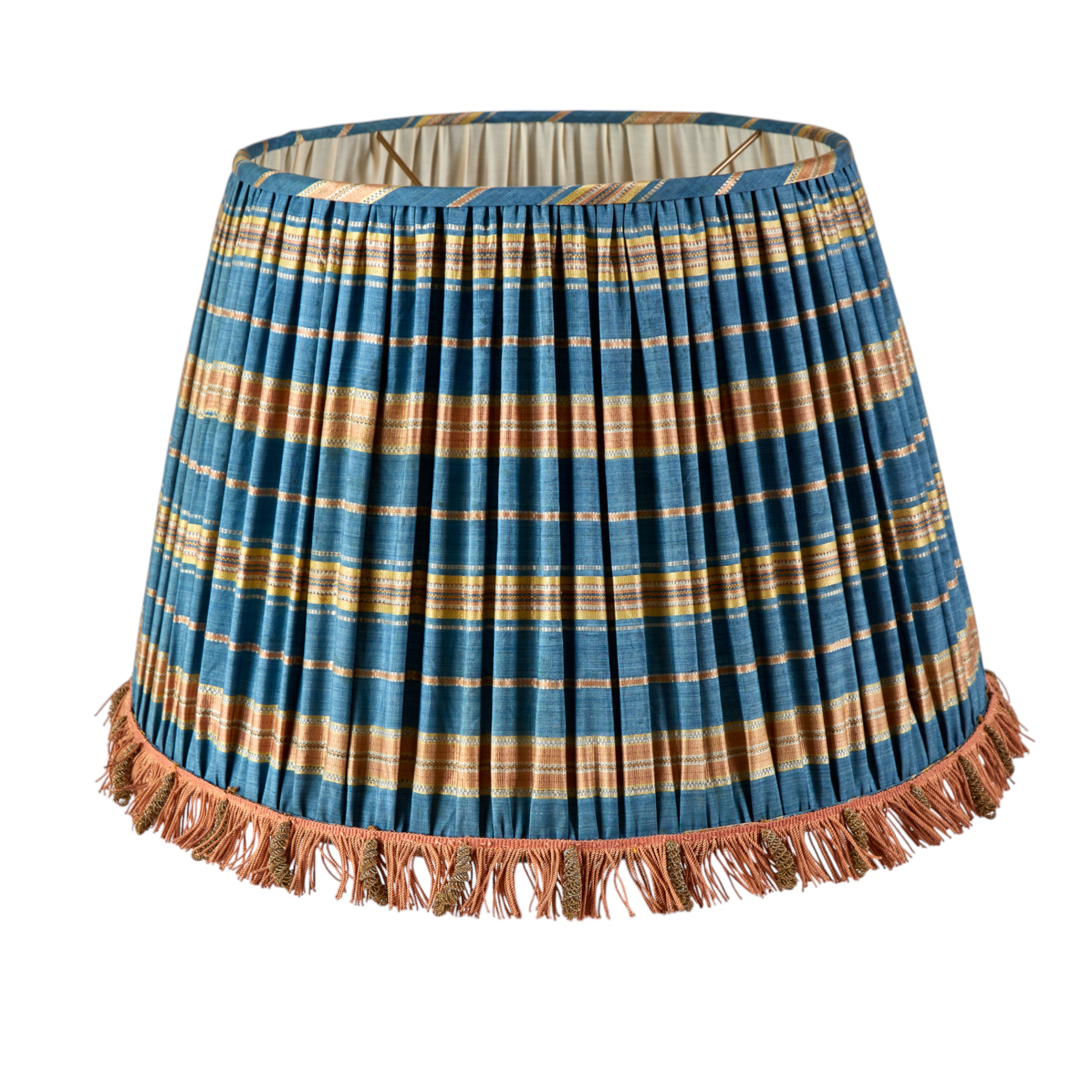 A pair of large gathered lampshades in antique blue and amber striped silk with a silk old cut fringe