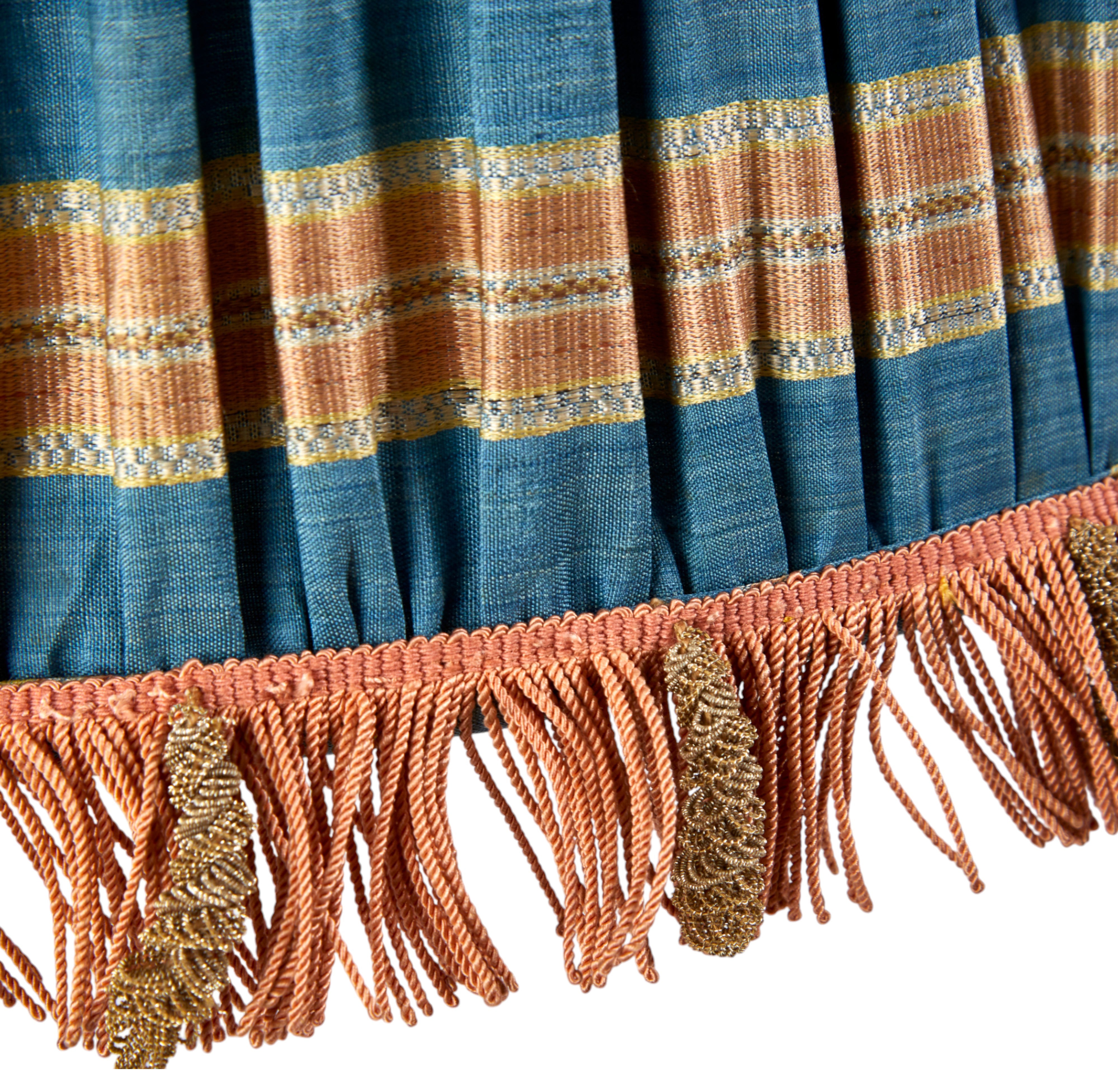 A pair of large gathered lampshades in antique blue and amber striped silk with a silk old cut fringe
