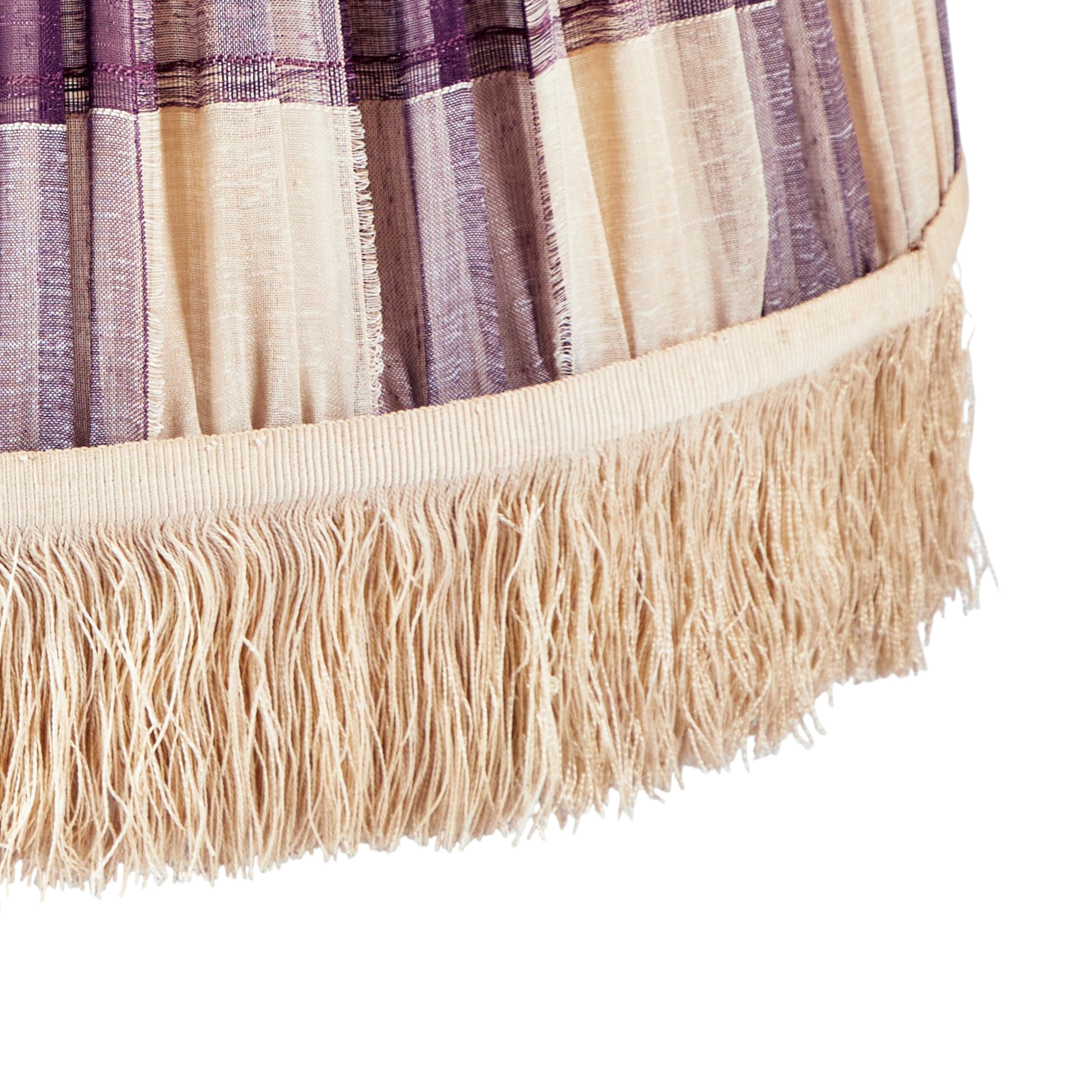A pair of large gathered shades made from a fine, oversized, aubergine checked voile with antique ivory silk cut fringe