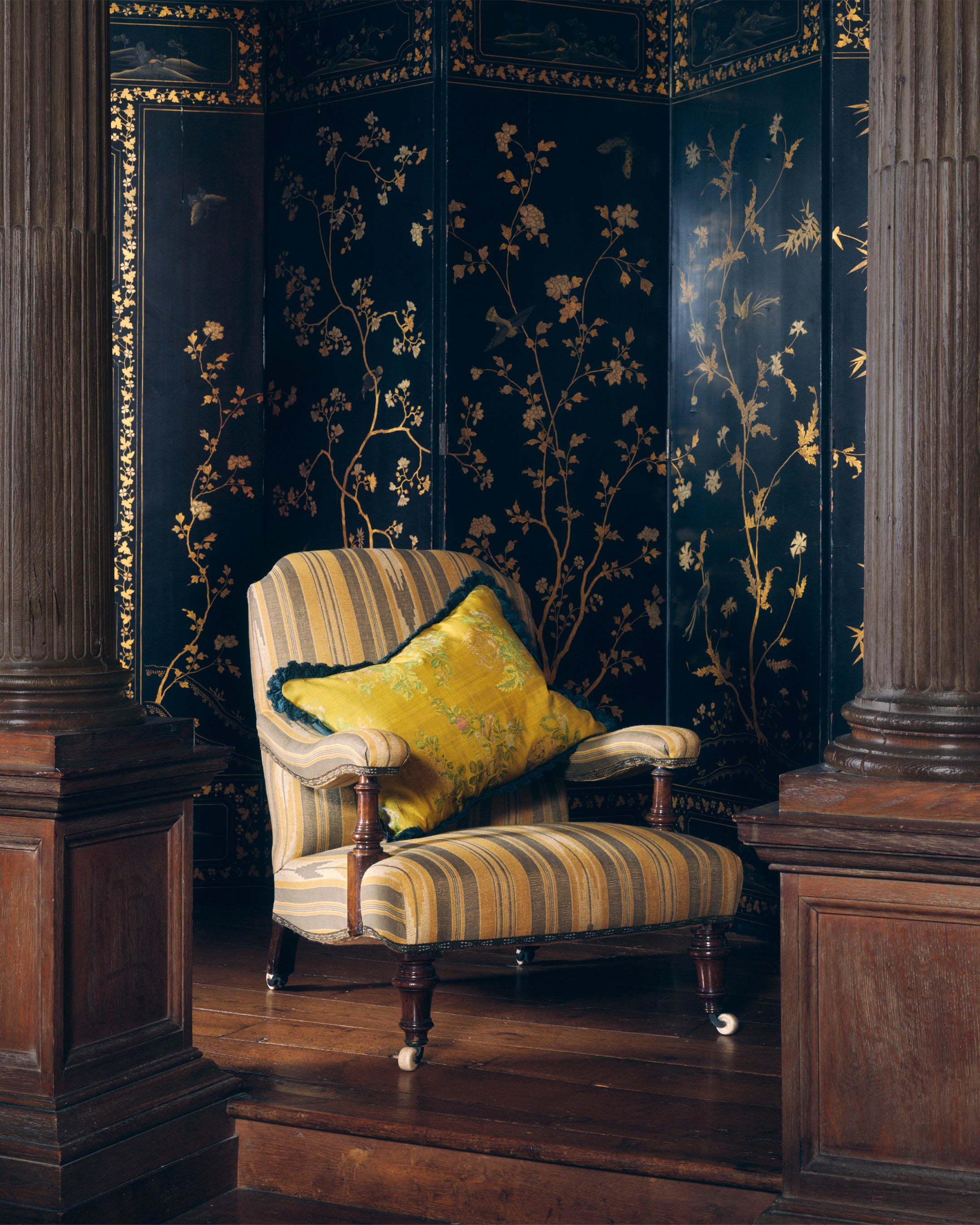 A silk cushion made from a unique 18th Century French document with a scalloped woollen trim
