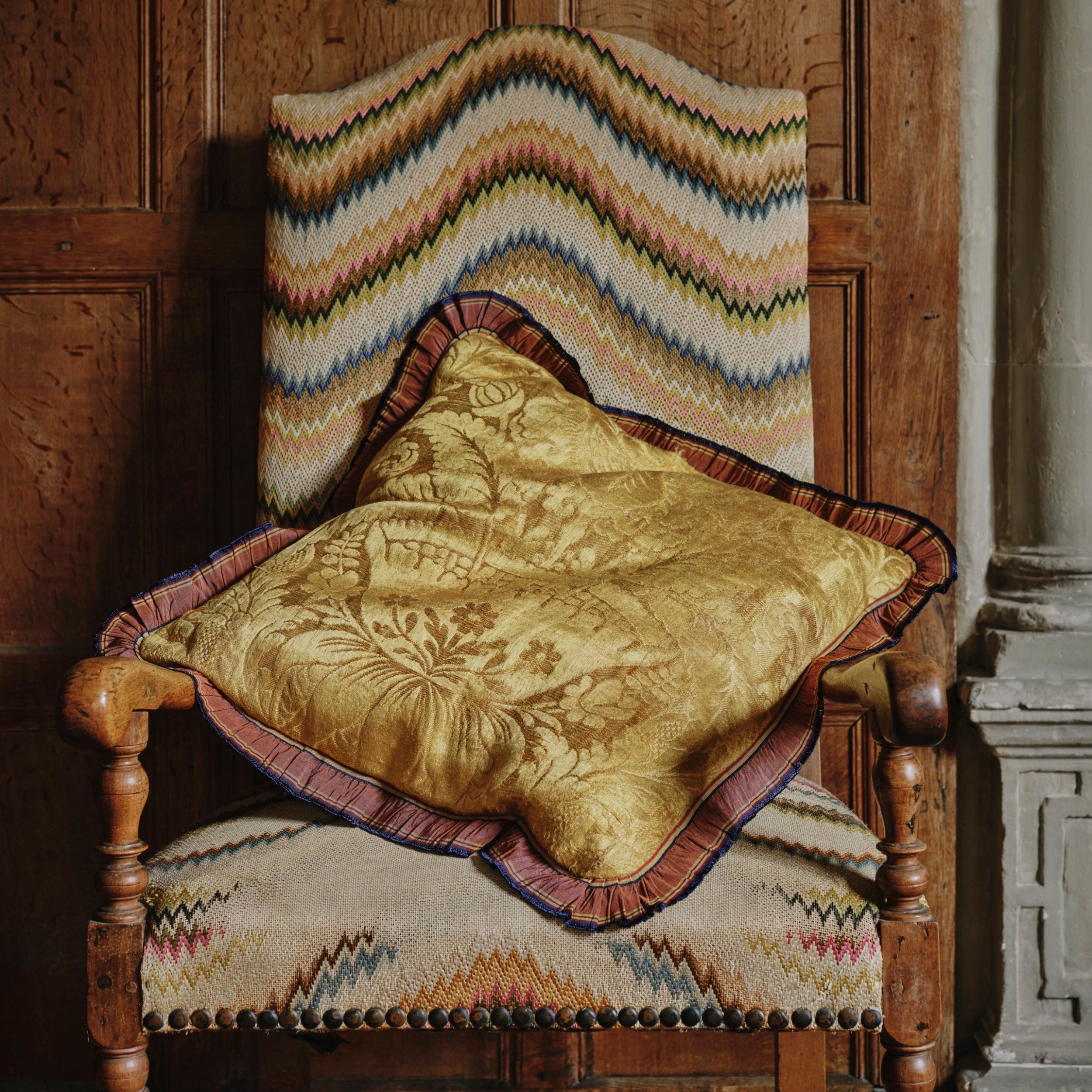 A Pair of Cushions made from 18th Century Gold Italian Silk Damask with an Antique French Grosgrain Ruffle Trim