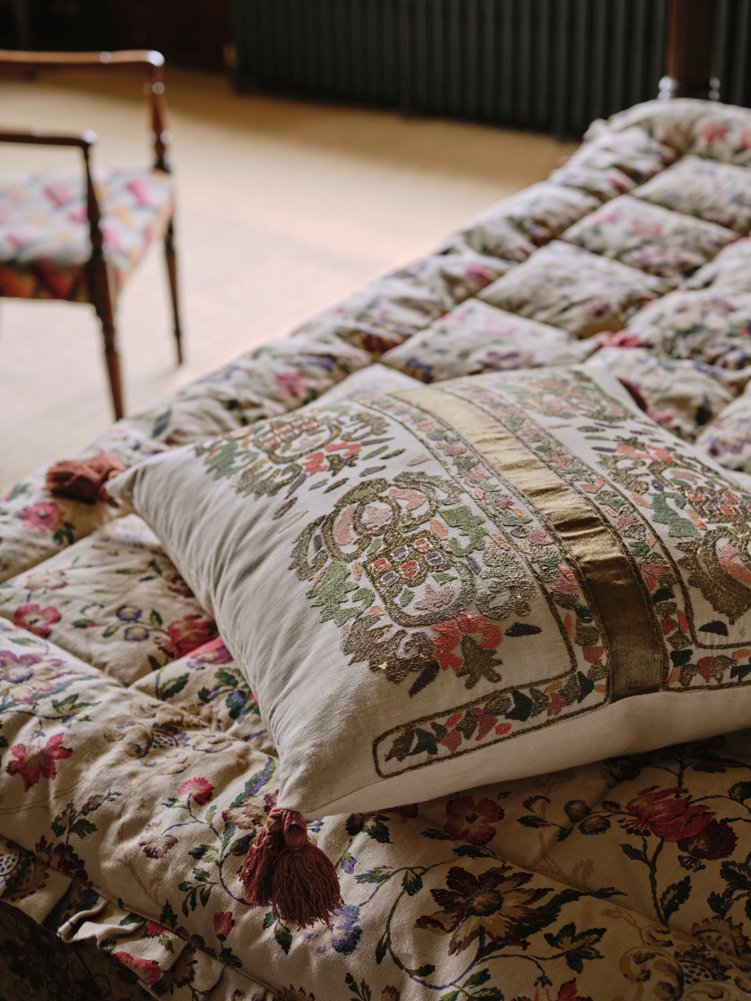 An Embroidered Ottoman Silk and Metallic Thread Cushion with Tassel Trims