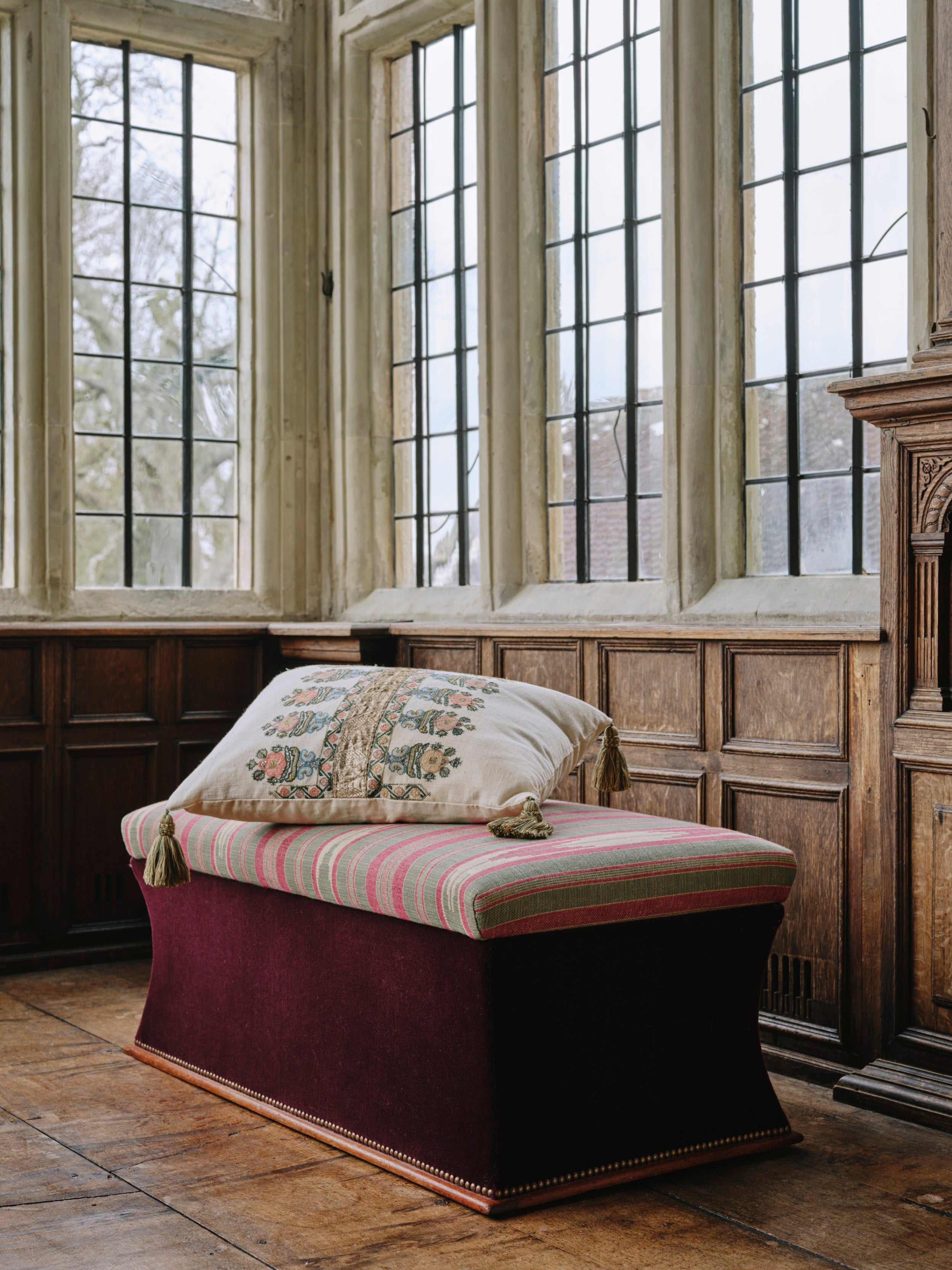 A Cushion made from an Embroidered Ottoman Fragment with Antique Braid and Corner Tassels