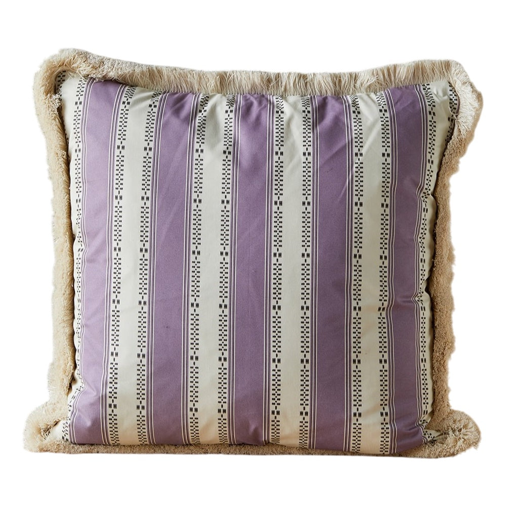 A Large Cushion in Broken Stripe Lilac with a brush fringe