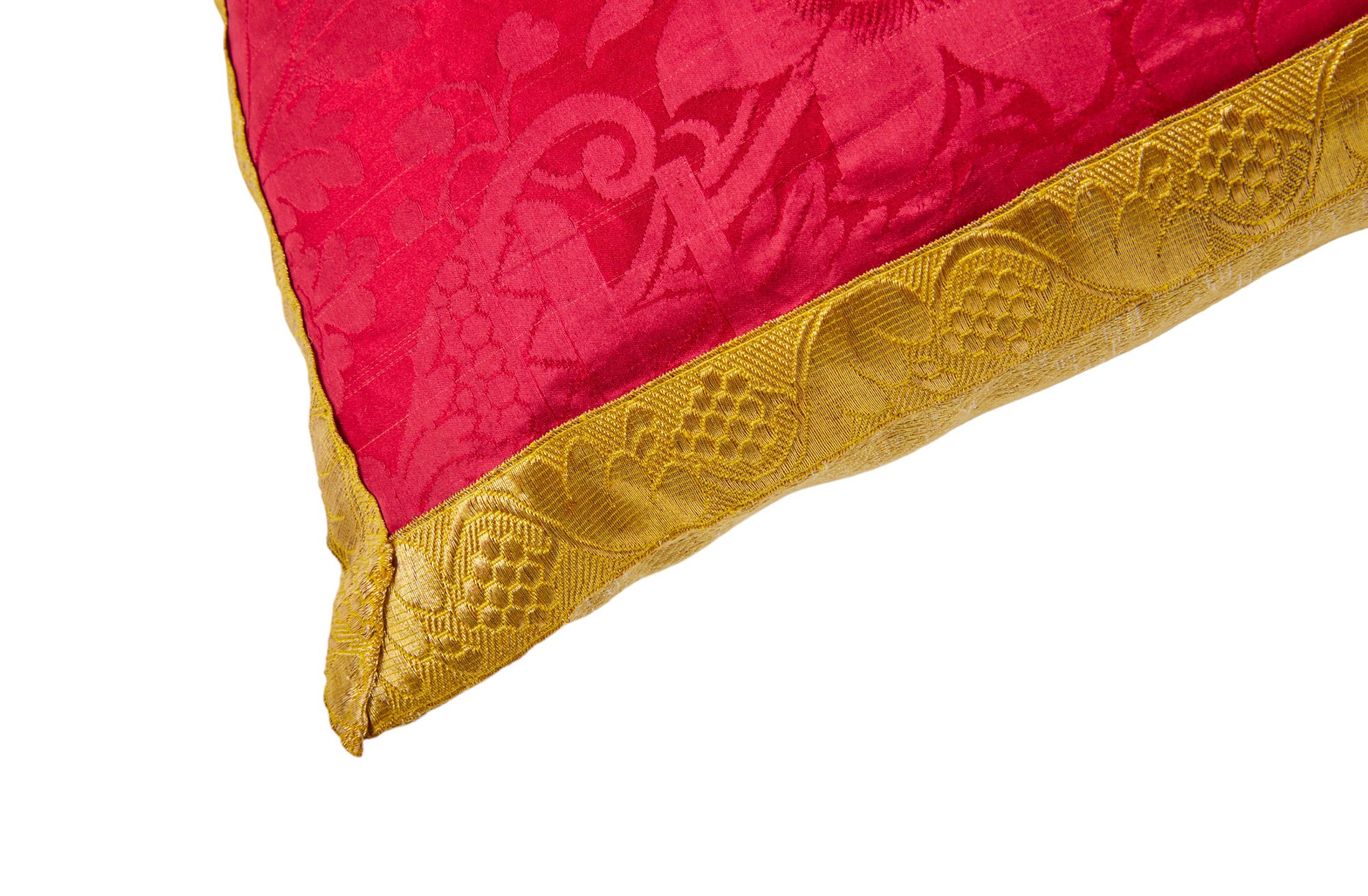 A Pair of Cushions made from an Early 19th Century Magenta Silk Damask with Antique Gold Braid