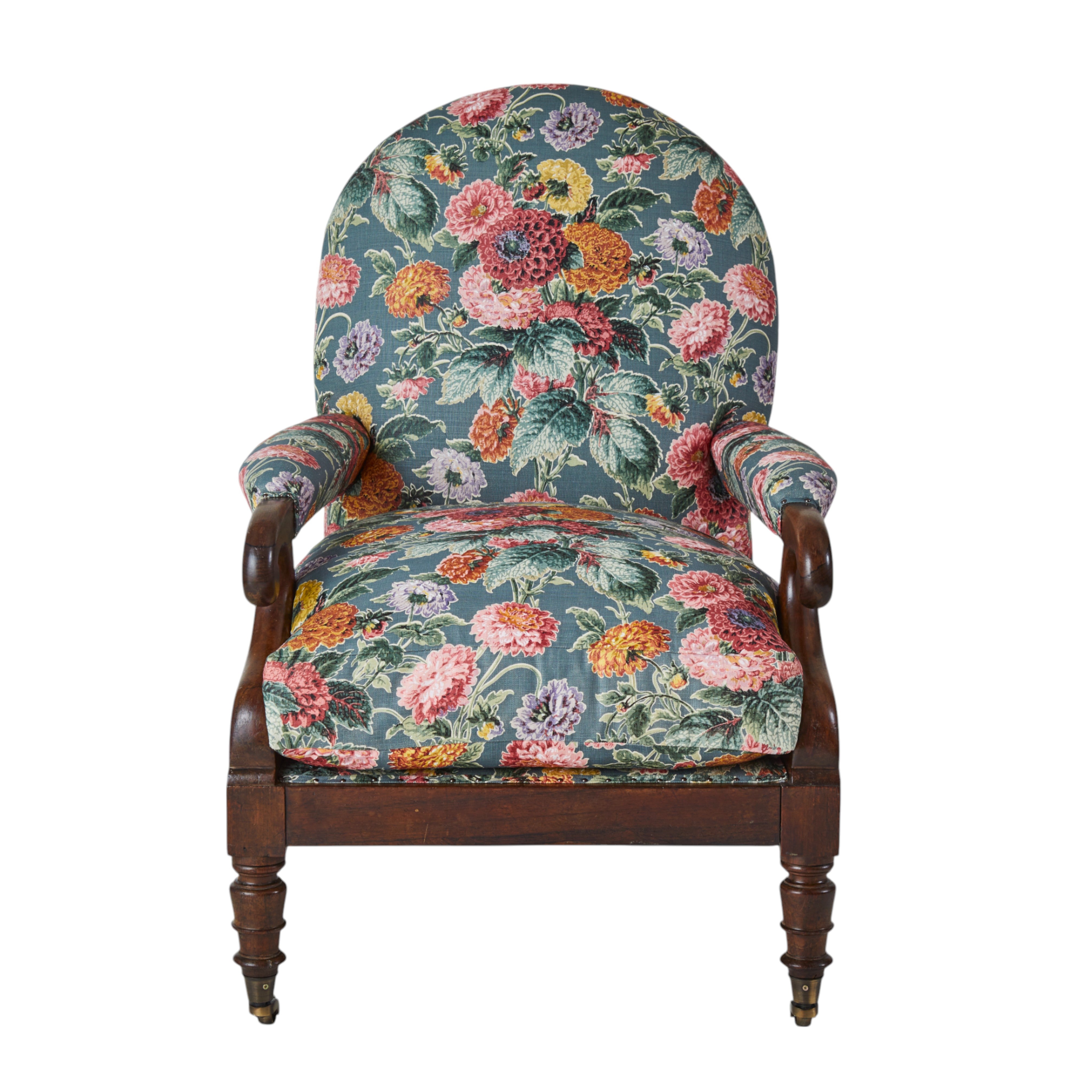 A 19th Century Round backed scroll armed chair upholstered in Flora Soames Dahlias