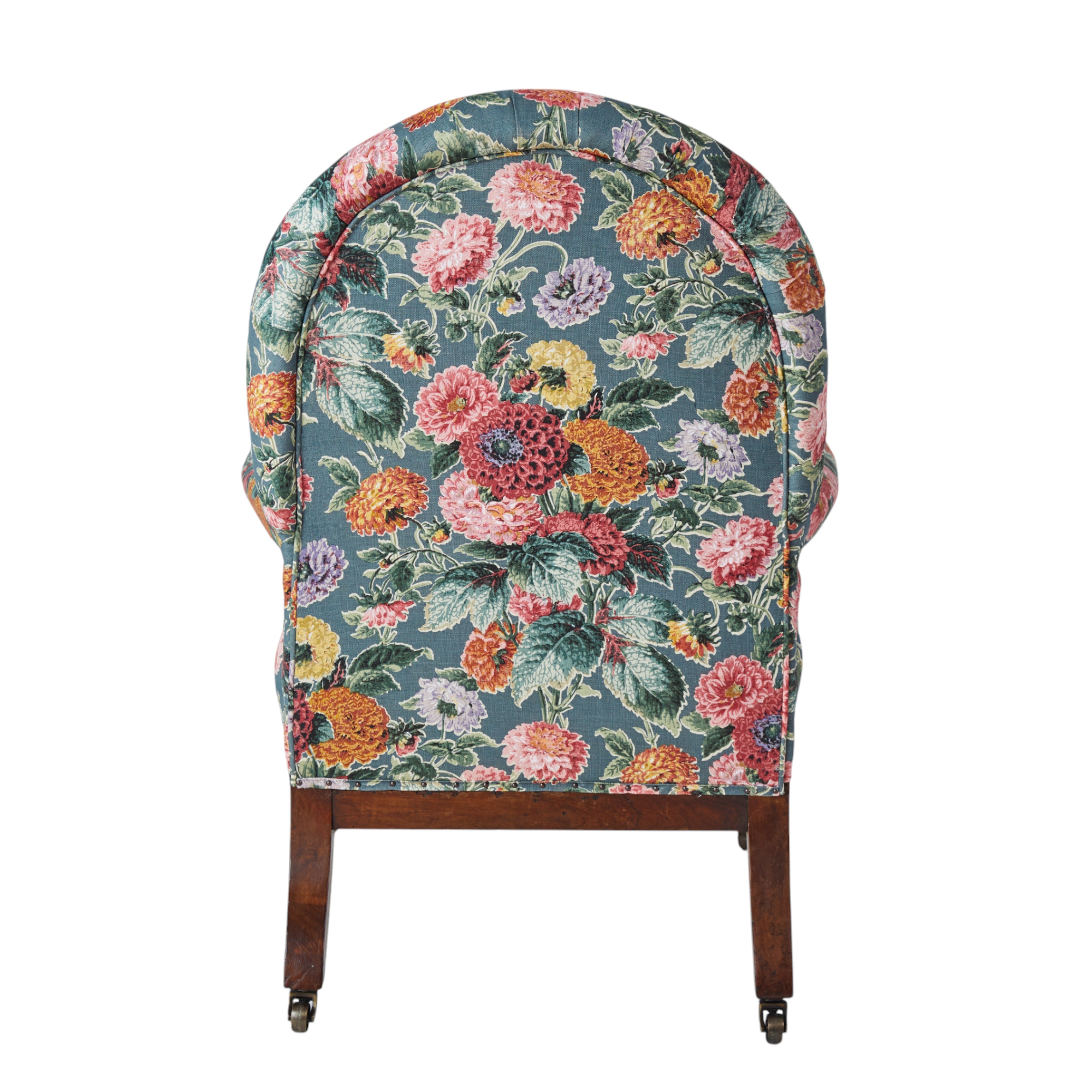 A 19th Century Round backed scroll armed chair upholstered in Flora Soames Dahlias