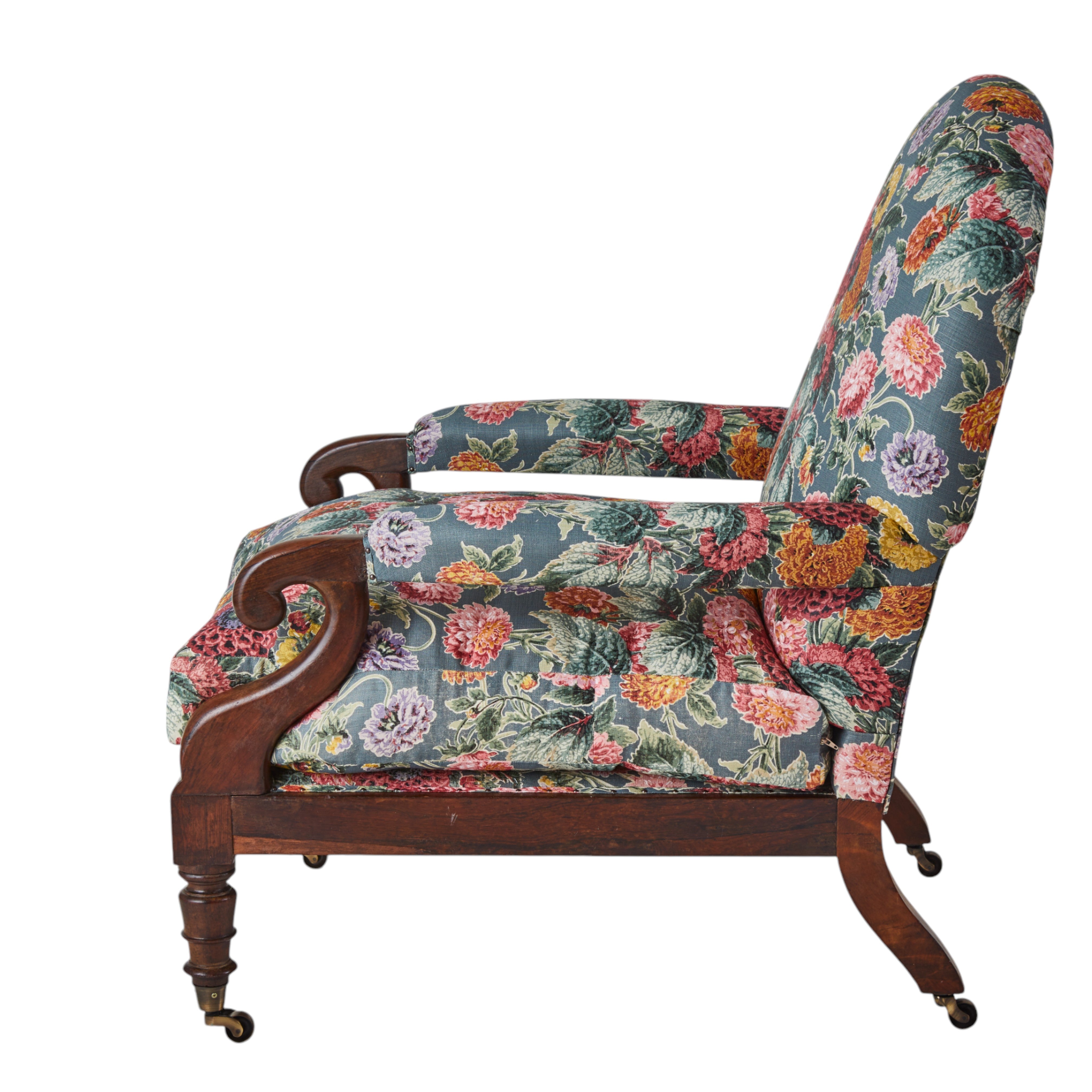 A 19th Century Round backed scroll armed chair upholstered in Flora Soames Dahlias