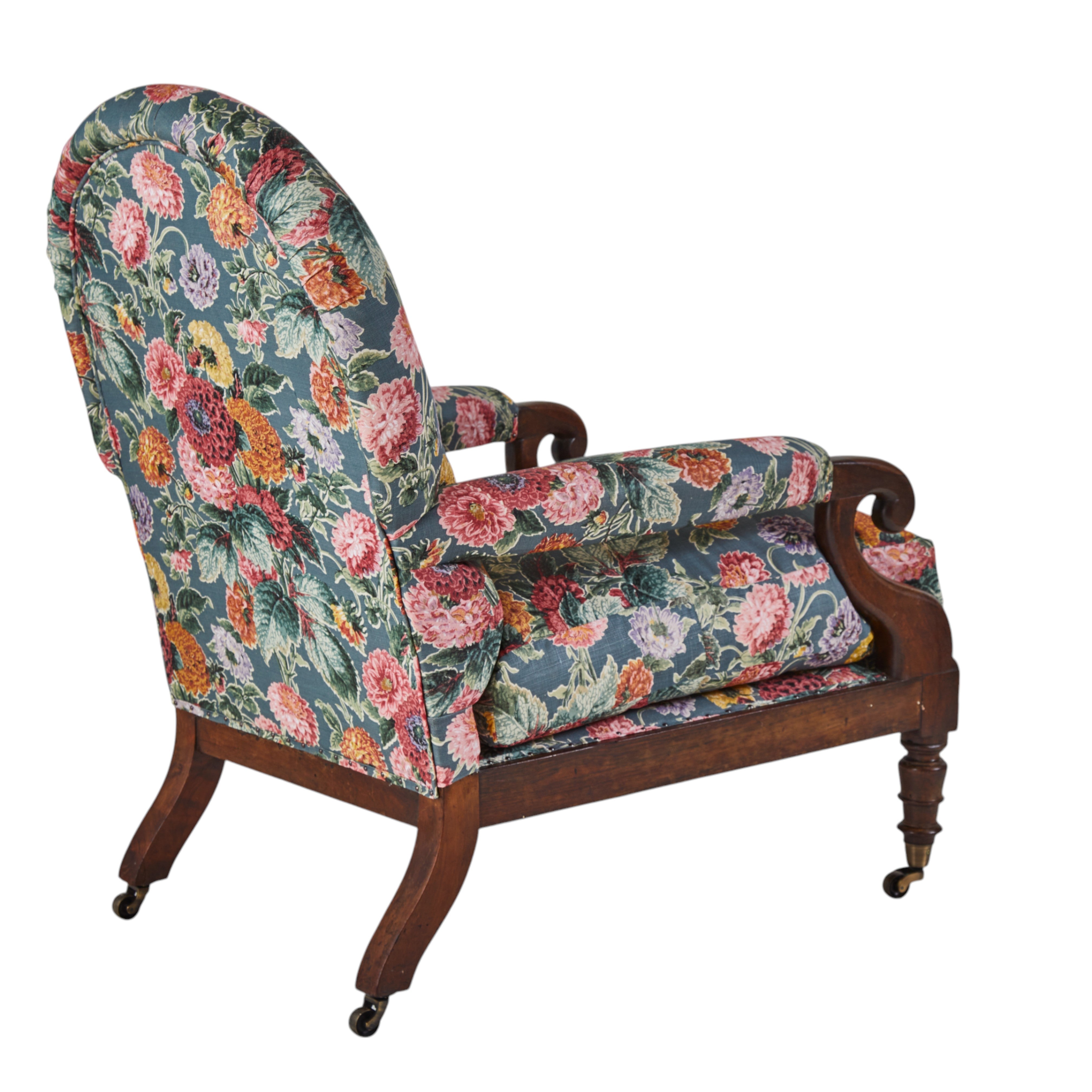 A 19th Century Round backed scroll armed chair upholstered in Flora Soames Dahlias