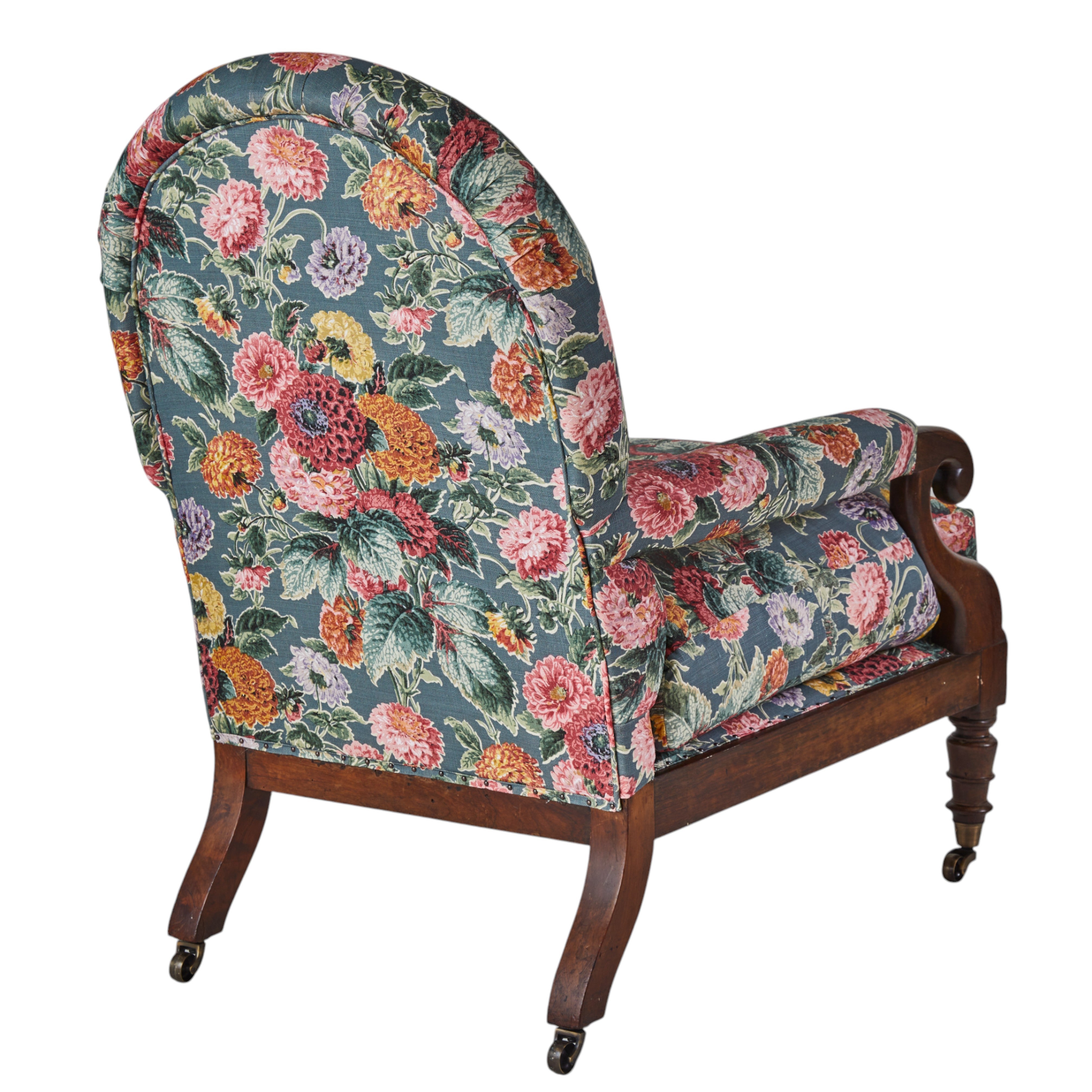 A 19th Century Round backed scroll armed chair upholstered in Flora Soames Dahlias