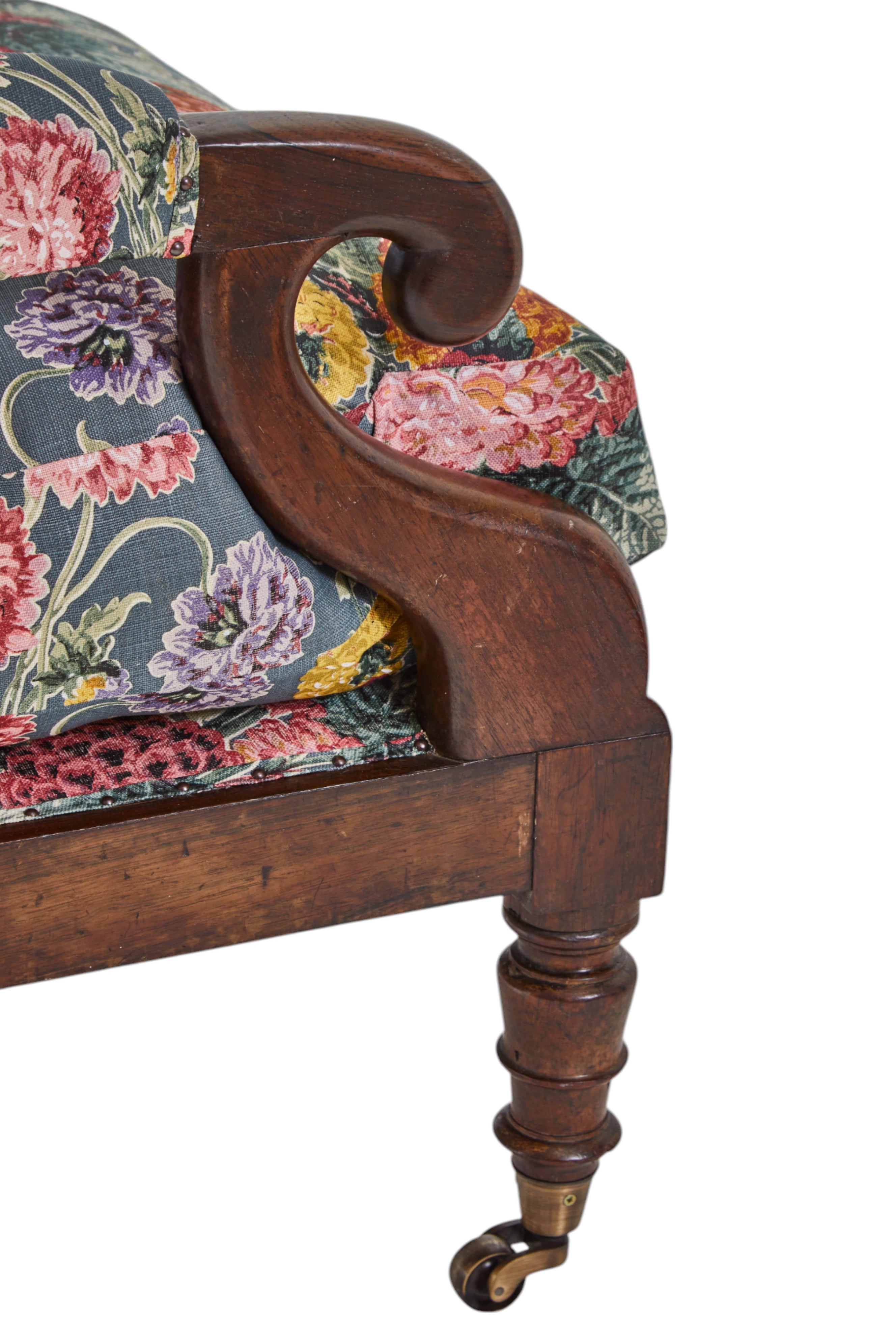 A 19th Century Round backed scroll armed chair upholstered in Flora Soames Dahlias