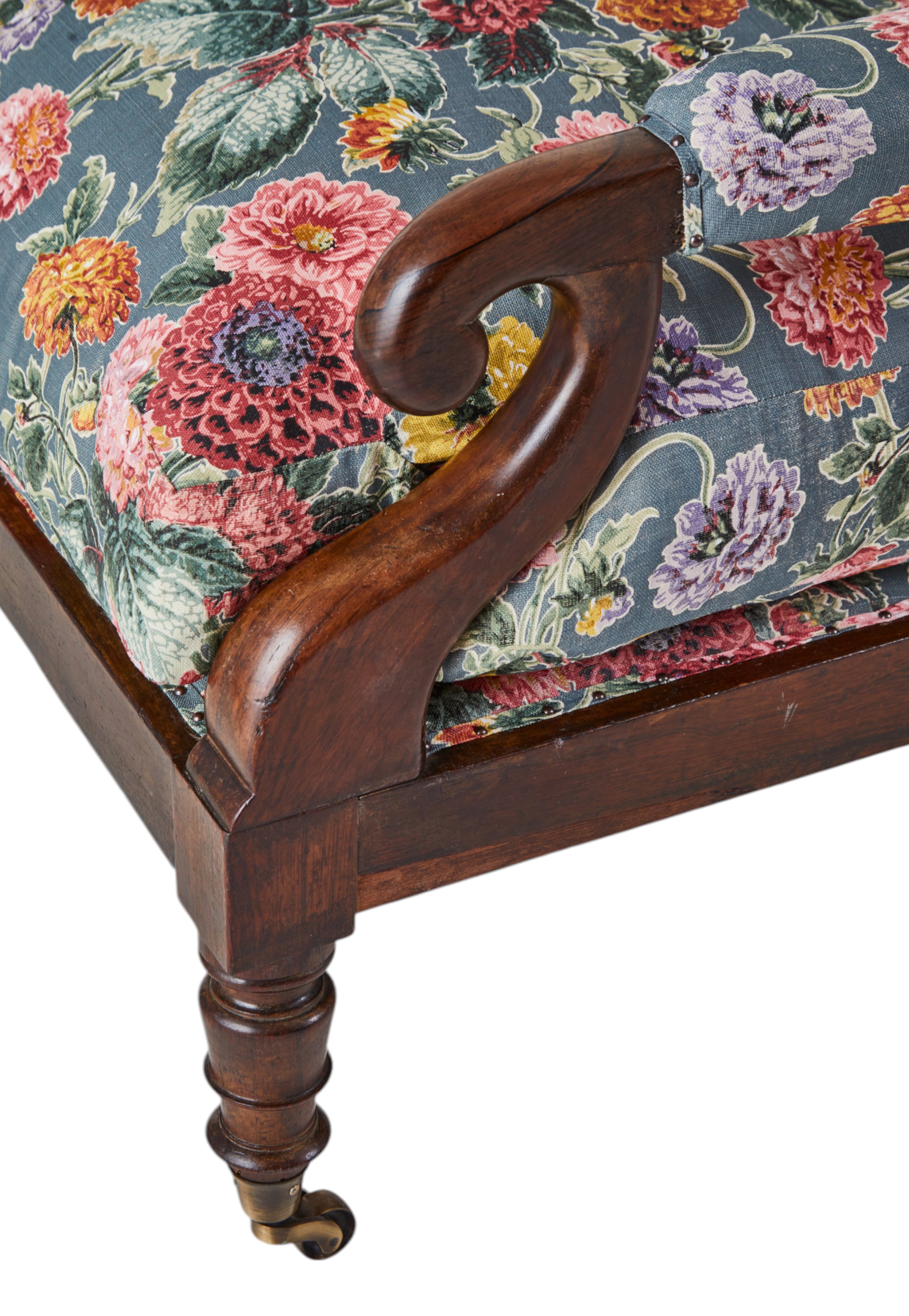 A 19th Century Round backed scroll armed chair upholstered in Flora Soames Dahlias