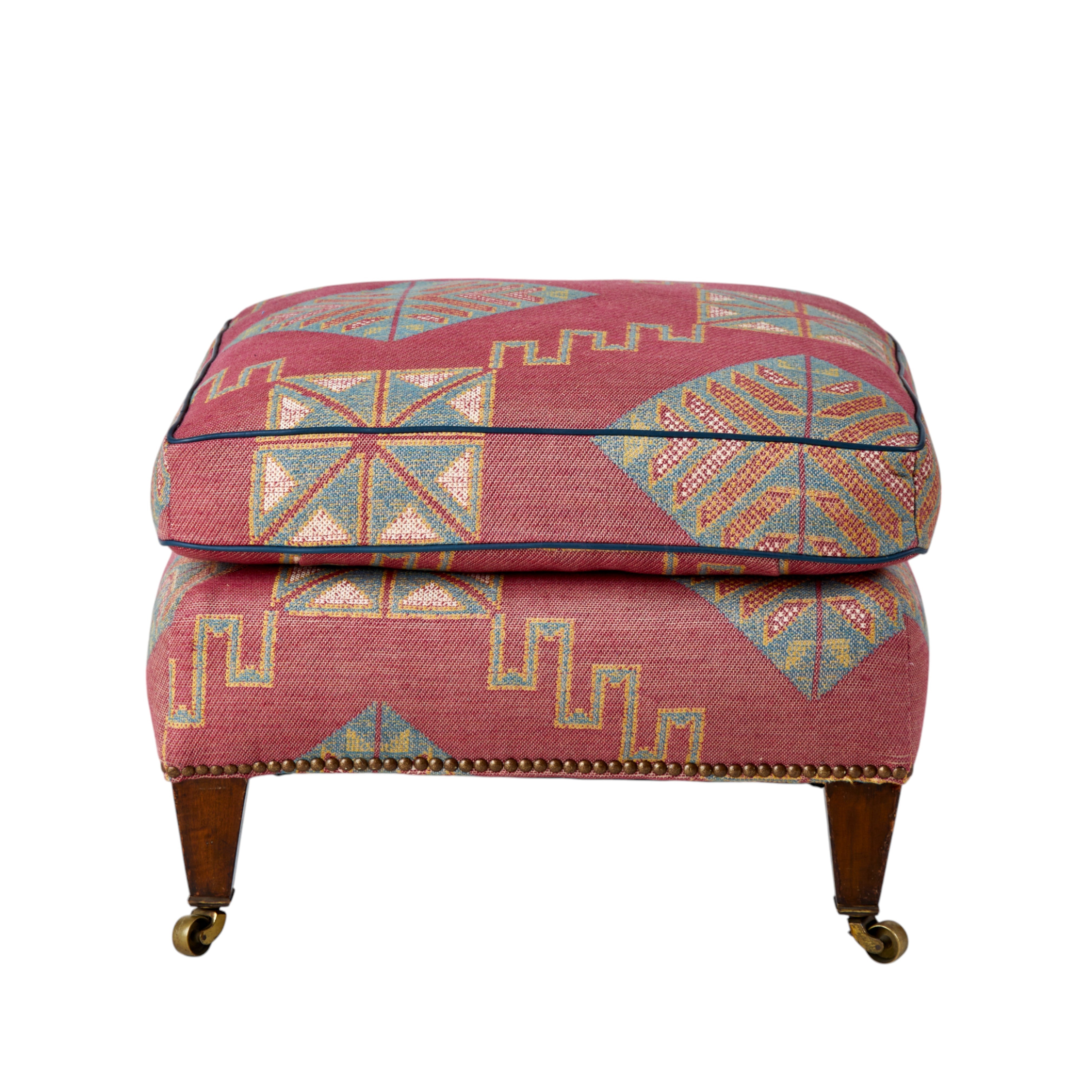 An original Howard Stool upholstered in Chartwell Weave Pink
