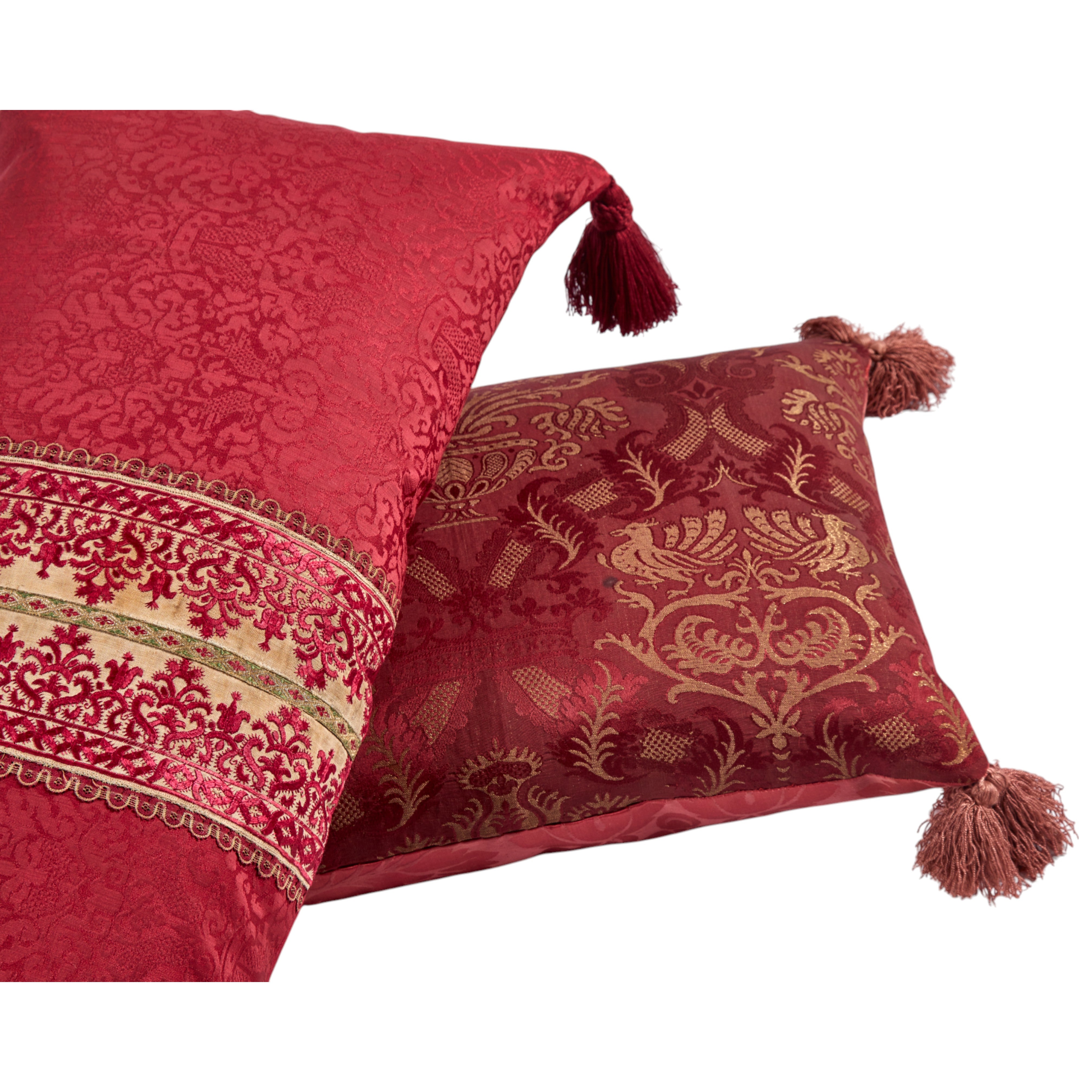 A long oblong cushion in a scarlet silk damask with 18th Century Greek Embroidered silk panel and Italian silk tassles