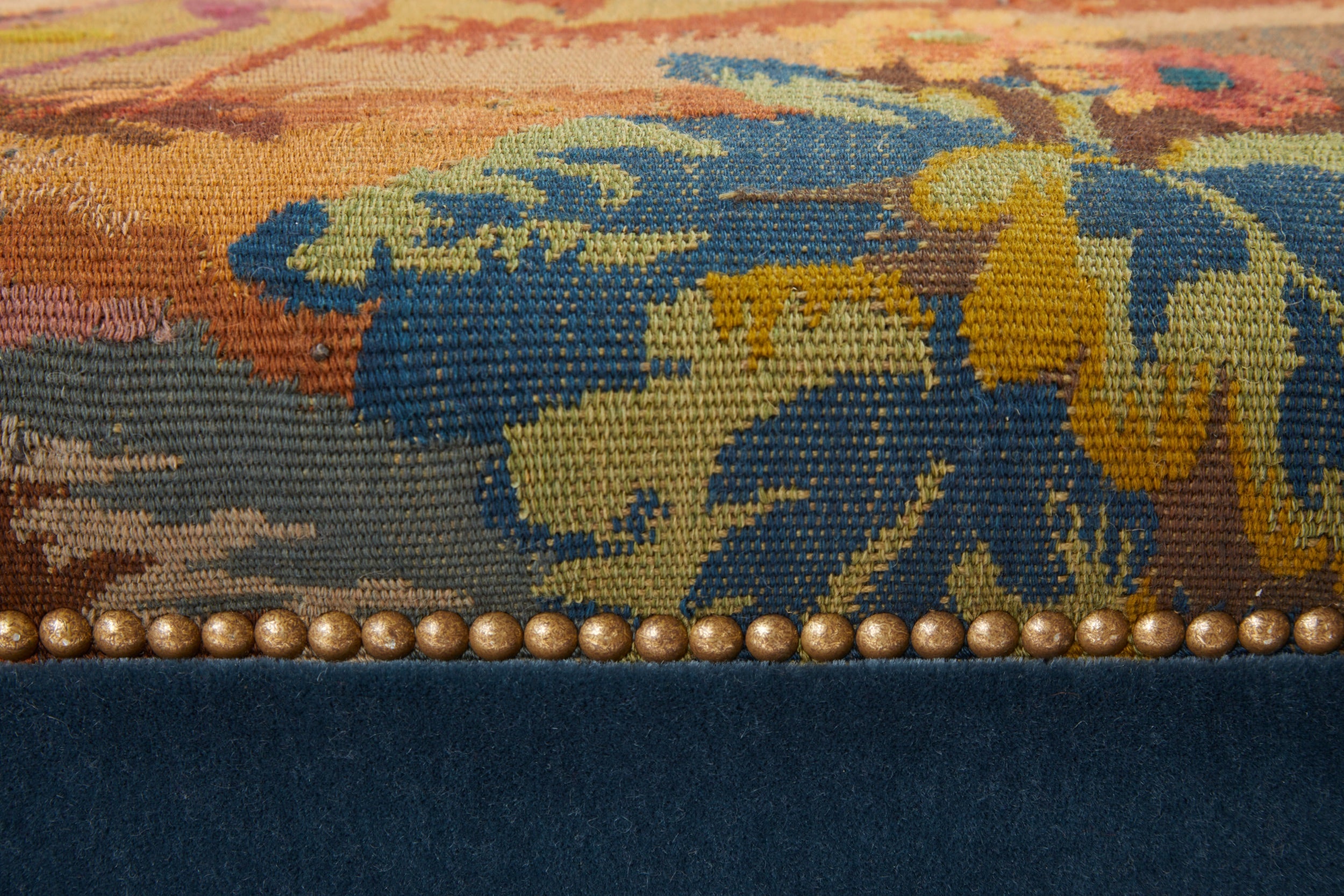 A Bespoke Upholstered Ottoman with a 19th Century English Needlework Top