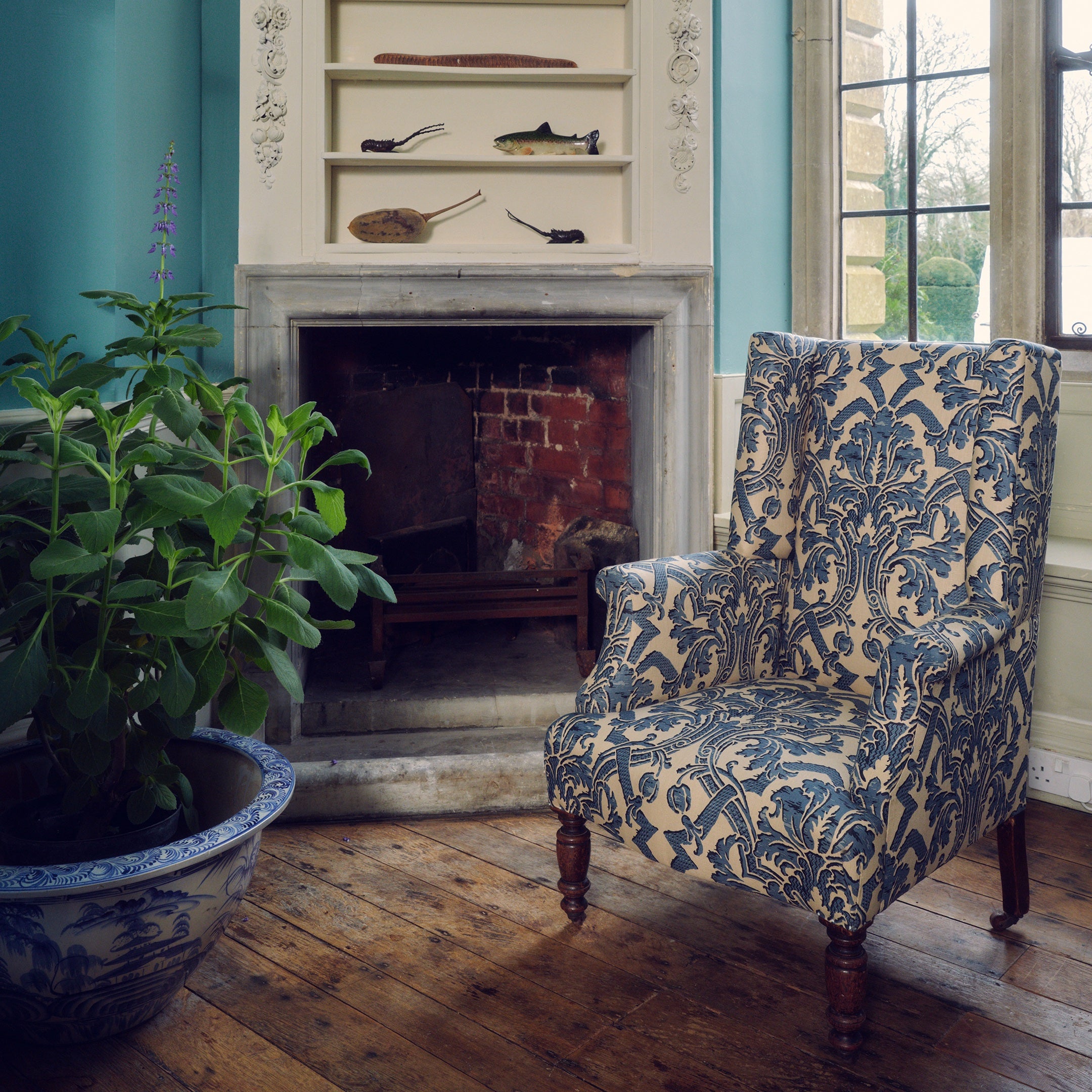 A Small 19th Century Wingback Armchair upholstered in China Blue Stockton Linen